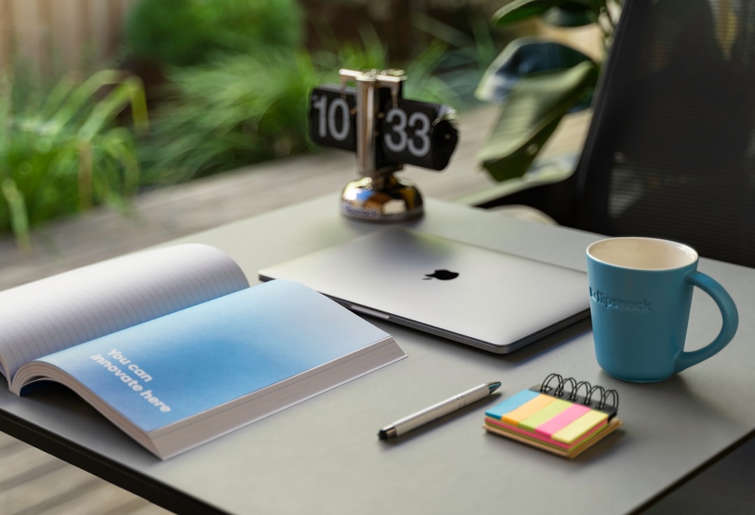 Cover illustration for a daily planning system with a notebook, calendar blocks, and a focused desk setup